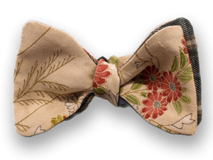 Men’s beige floral selftie bow tie made from a vintage kimono. Bow tie red and green flowers from groom boho naturalistic