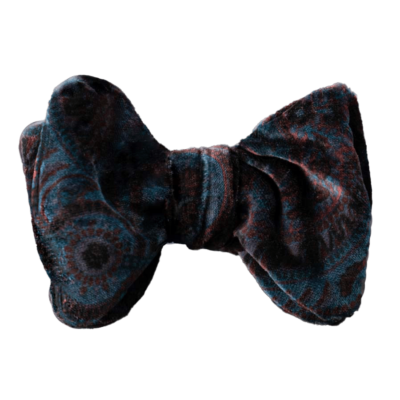 Elegant self-tie bow tie in blue and brick red paisley velvet.