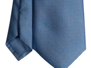cravatta finto unito azzurro sette pieghe punta spillo realizzata a mano in Italia. Cravatta sartoriale punta spillo azzurro/grigio sette pieghe.