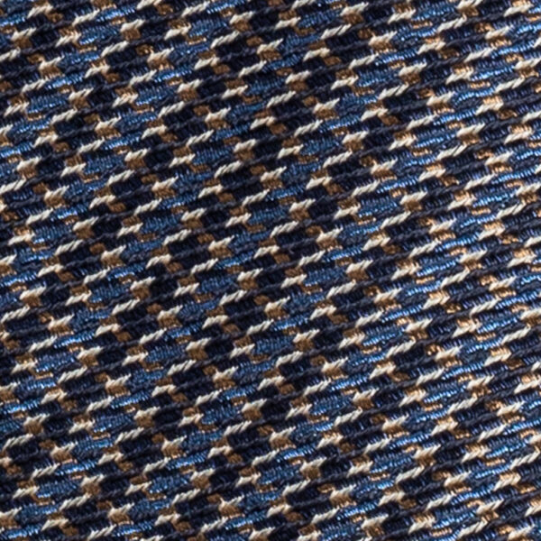 Cravatta fantasia geometrica blu, azzurro, bronzo e bianco in seta cruda tre pieghe realizzata a mano in Italia. Cravatta geometrica 3 pieghe