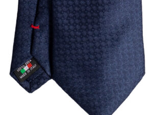 Cravatta finto unito blu in seta jacquard tre pieghe realizzata a mano in Italia. Cravatta falso unito blu 3 pieghe di alta qualità sartoriale
