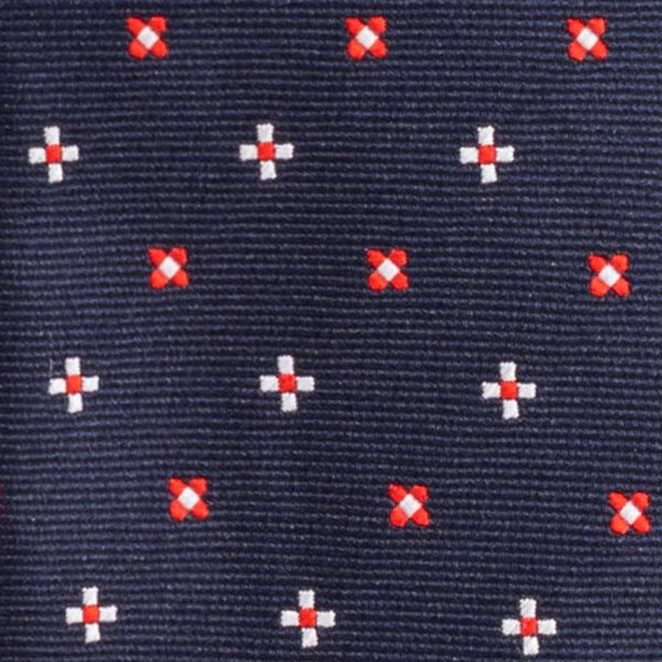 Cravatta blu micro fantasia rosso e bianco in twill di seta tre pieghe realizzata a mano in Italia. Cravatta blu micro fantasia 3 pieghe rosso