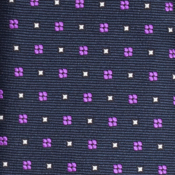 Cravatta blu micro fantasia viola e bianco in twill di seta tre pieghe realizzata a mano in Italia. Cravatta blu micro fantasia 3 pieghe viola