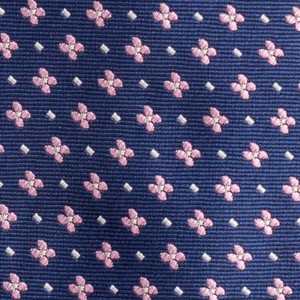 Cravatta blu micro fantasia rosa e bianco in twill di seta tre pieghe realizzata a mano in Italia. Cravatta blu micro fantasia 3 pieghe rosa