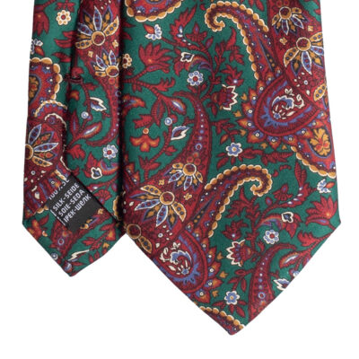 Cravatta fantasia paisley rosso verde blu giallo in twill di seta tre pieghe realizzata a mano in Italia. Cravatta fantasia cachemire a girali 3 pieghe