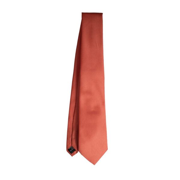 Cravatta unito rosa antico in twill di seta tre pieghe realizzata a mano in Italia. Cravatta unito rosa antico 3 pieghe di alta qualità sartoriale.