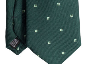 Cravatta verde micro fantasia bianco in seta jacquard sette pieghe realizzata a mano in Italia. Cravatta micro fantasia sette pieghe di alta qualità