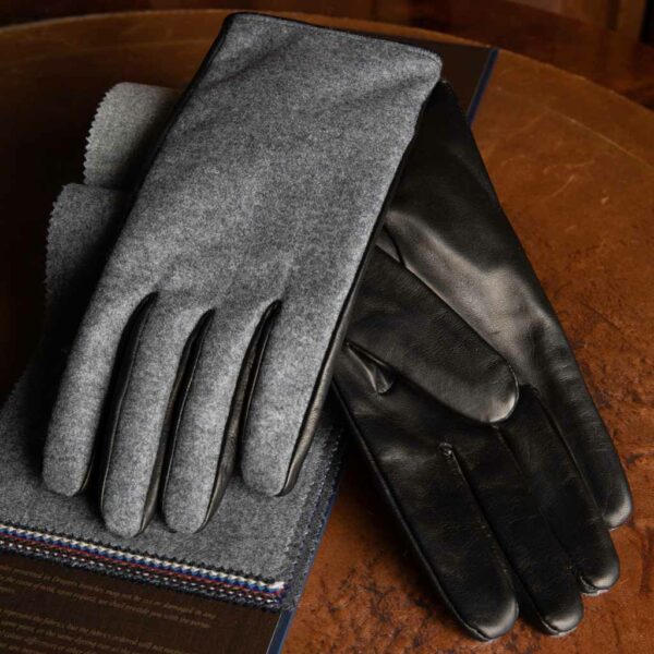 Eleganti guanti da uomo in pelle di agnello nero e dorso in flanella grigio chiaro mèlange Vitale Barberis Canonico foderati in puro cashmere