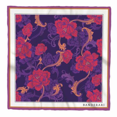 Elegante fazzoletto da taschino in seta orlata a mano dalla fantasia floreale magenta viola arancione. Pochette da giacca colorata e versatile.