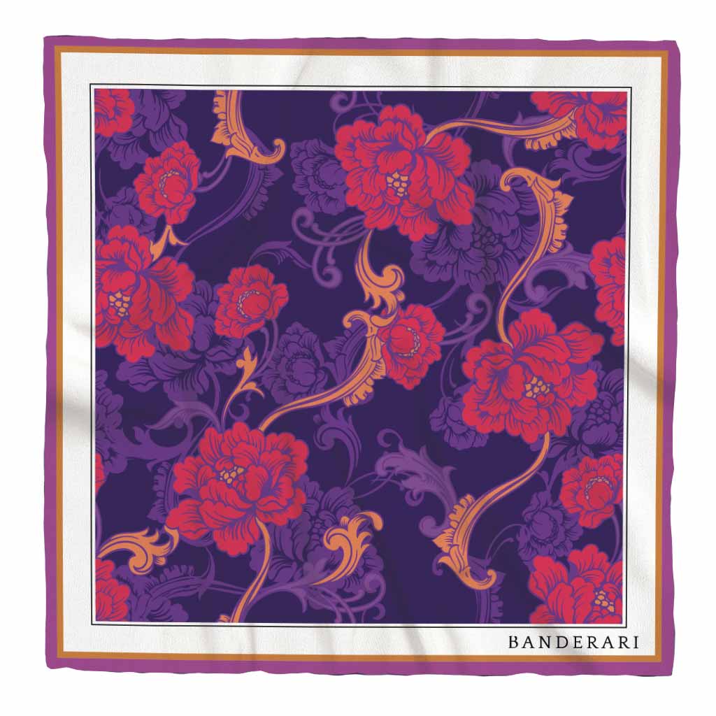 Elegante fazzoletto da taschino in seta orlata a mano dalla fantasia floreale astratta verde viola arancione. Pochette da giacca colorata e versatile.